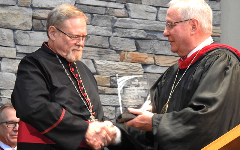 Rev. Larry Wright being honored as the 2018 Distinguished Graduate for SPST