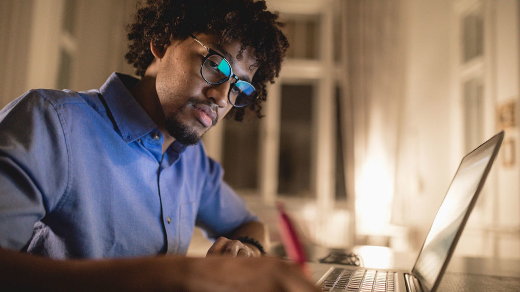 studyfeature Adult male student taking an online course